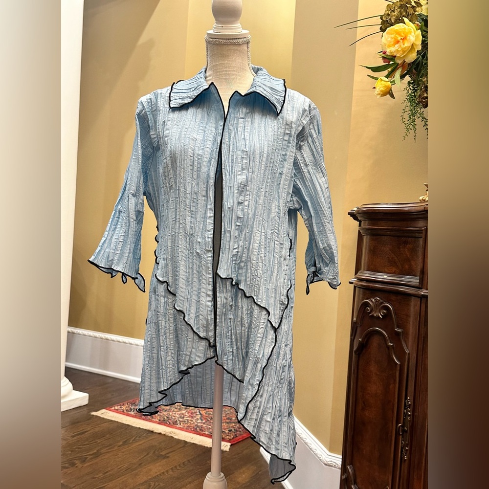 Light blue with black piping crinkle jacket by Jes. Size L